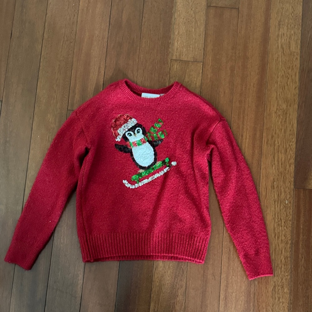 Place Red Sweater with Festive Penguin